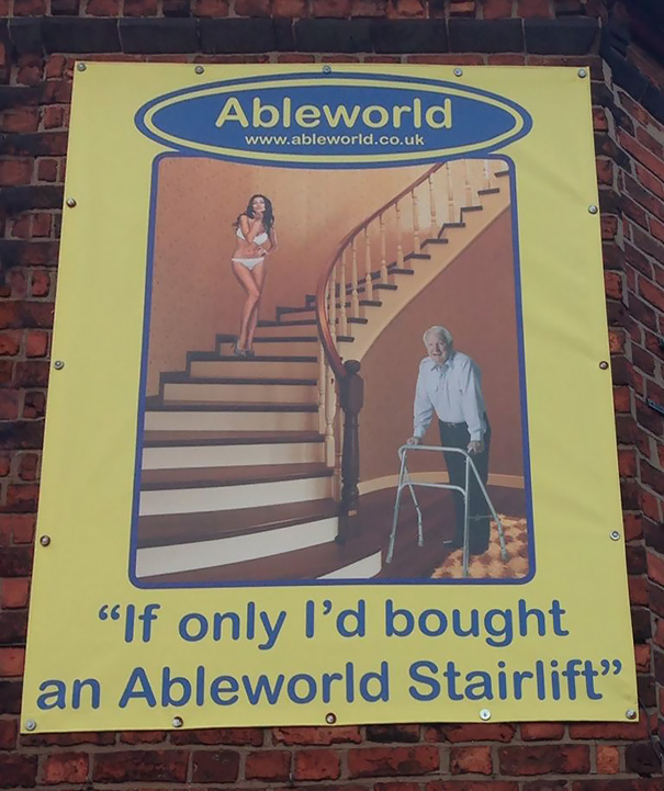 This Is A Real Advertising Poster Above A Shop For Mobility Products