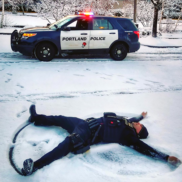 Officer Couldn't Resist The Snow Angel