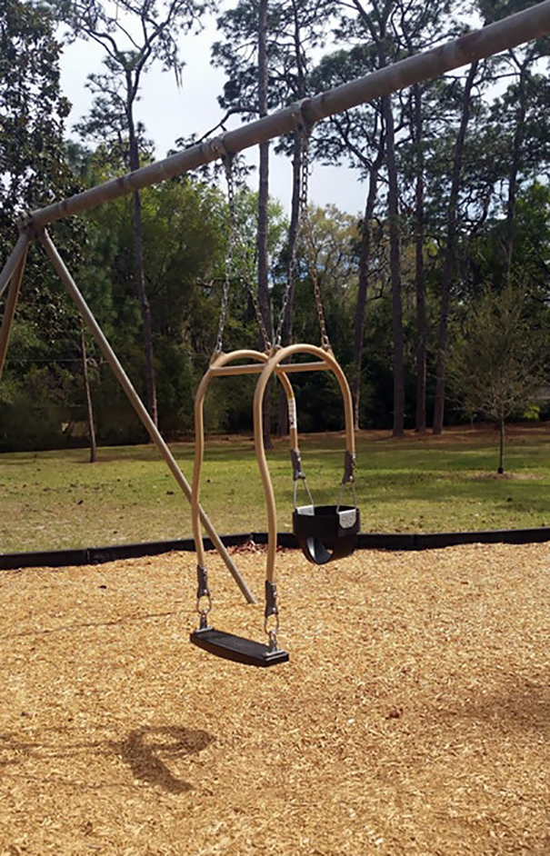 This Swing Is Designed So That The Kid And The Parent Can Swing Together