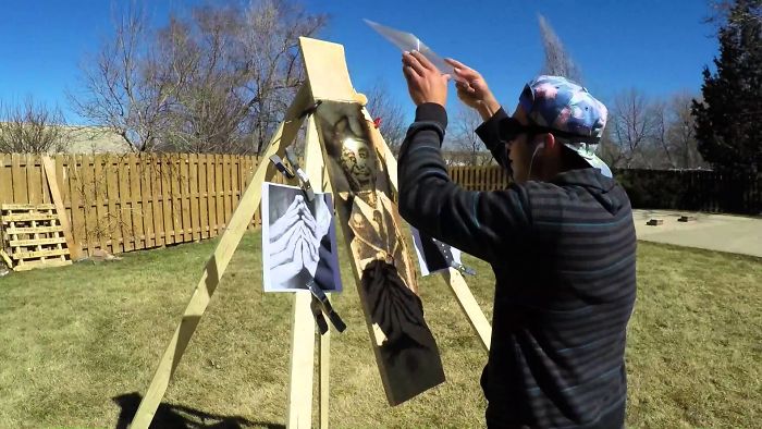 Man Uses Sunlight To Burn Image Of Fallen Soldier Onto A Piece Of Wood