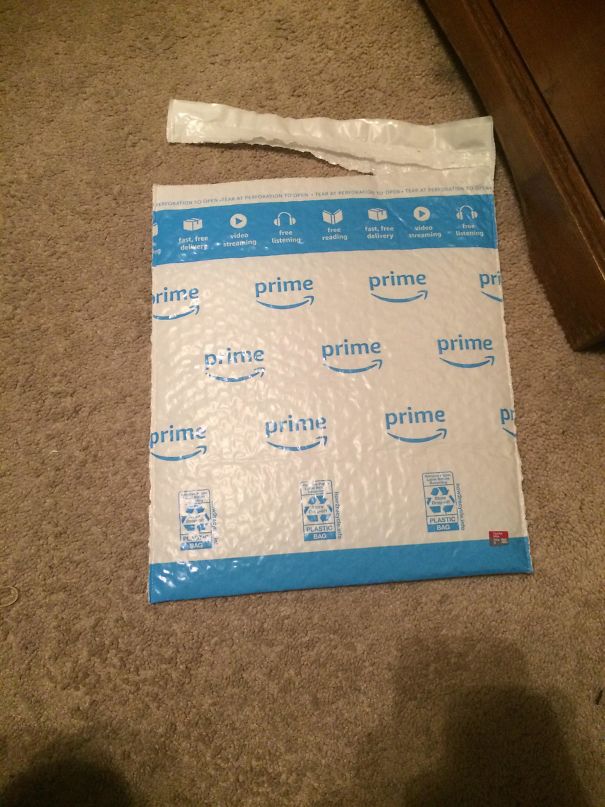 They Sent Me This Tiny Micro SD Card (Red Thing On The Bottom Right) In This Huge Package. What A Waste Of Plastic
