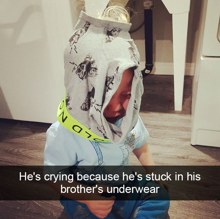 He's Crying Because He's Stuck In His Brother's Underwear