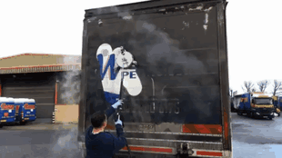 Power Washing A Dirty Truck