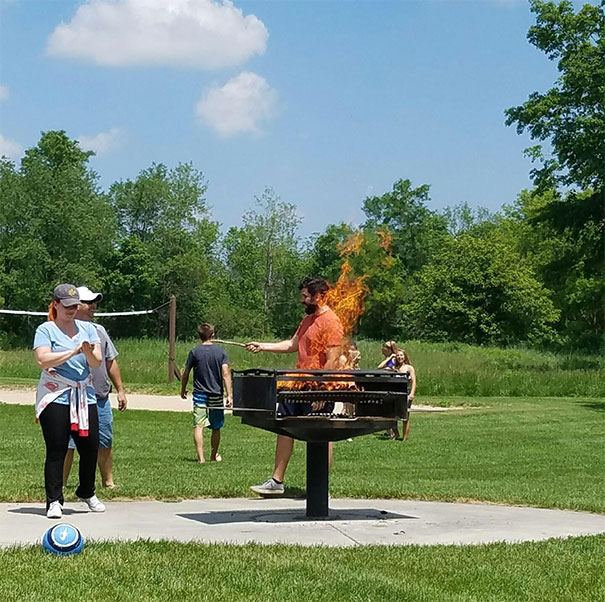 This Photo Of Me Standing Behind A Grill Looks Like I'm On Fire