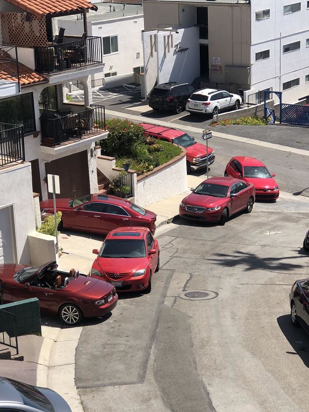 All These Red Cars Strangely Collected On My Street