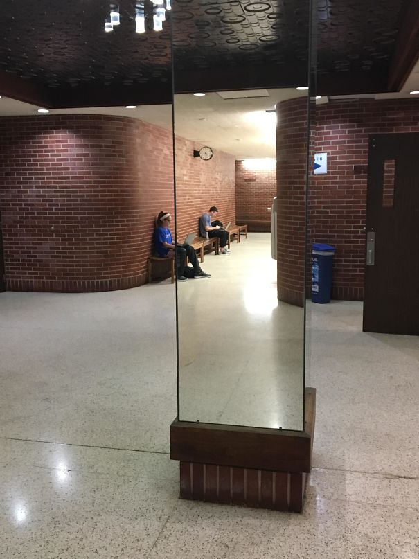 This Mirror Column In A Building On My College Campus Seems See Through When Looking Down The Hallways