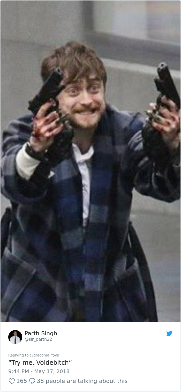Daniel Radcliffe Holding Guns