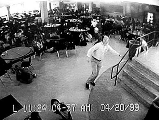 William "Dave" Sanders guiding more than 100 students out of the cafeteria during Columbine High School massacre