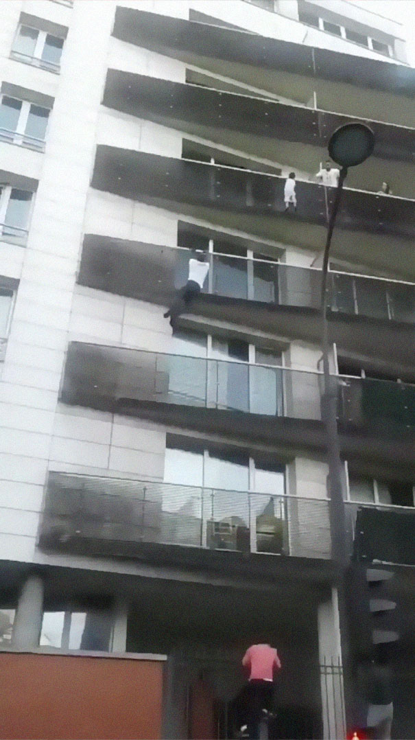 African Immigrant Climbs 4 Storeys With His Bare Hands In Less Than 30 Secs To Save 4-Year-Old Dangling From Balcony