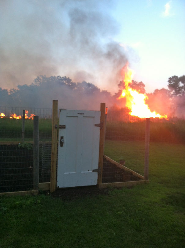 My Mother Sent Me This Picture, Saying "Look At The Cool New Door I Just Got For The Garden!"... No Mention Of Why There Was A Ravaging Prairie Fire In The Background...
