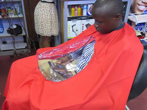 Haircut And Phone At The Same Time. We're Living In 2018 And This Guy Is Living In 3018