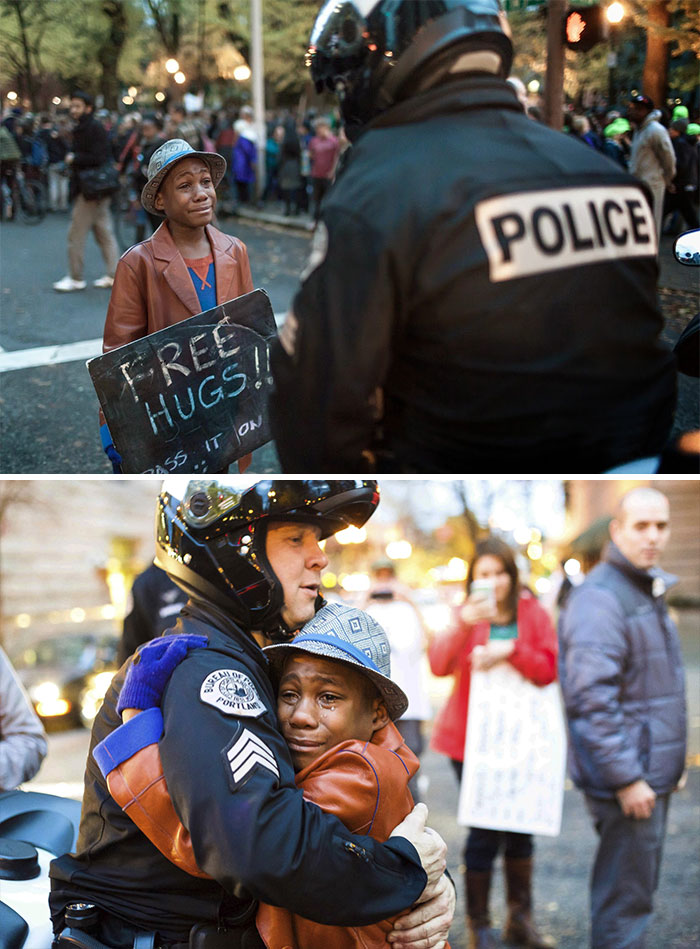 Niño de 12 años abrazando a un policía en la manifestación de Ferguson