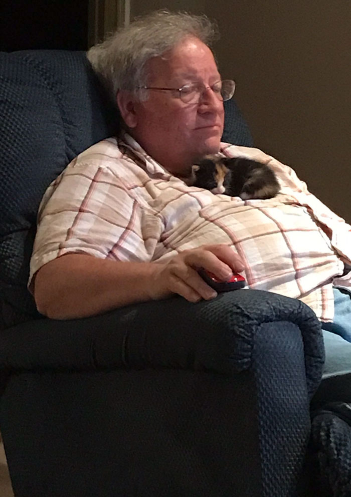 My Dad Has Never Had A Cat But Loves Mine When He Comes Over To My House. He Found A Kitten Crying Outside A Couple Days Ago Who Prefers Sleeping Like This. I Hope He Keeps It