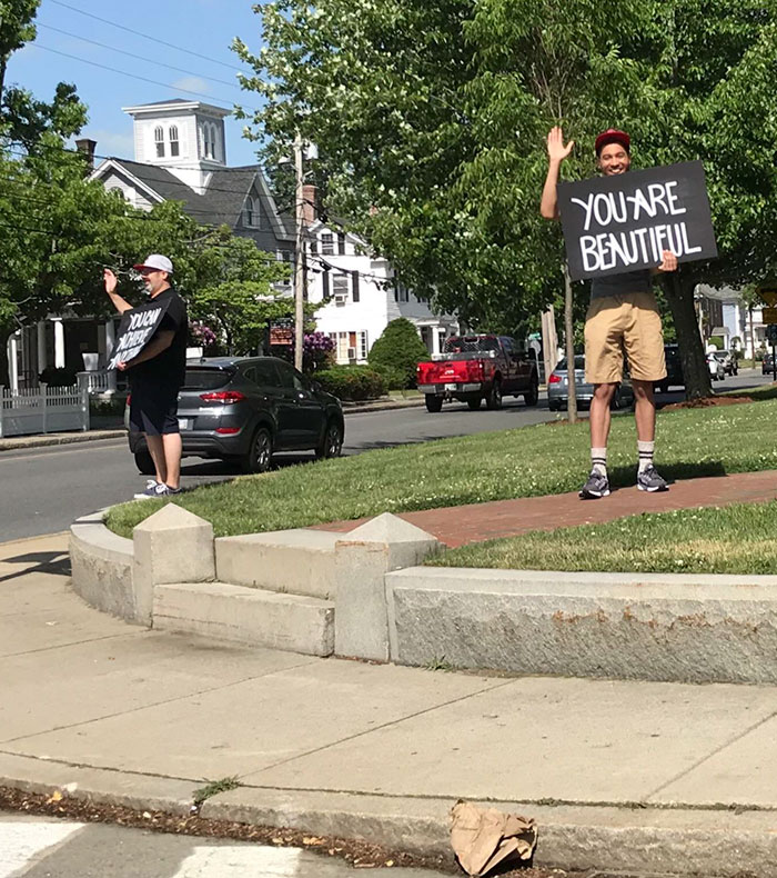 They Stand On This Corner All Day Once A Week With These Signs Just Because