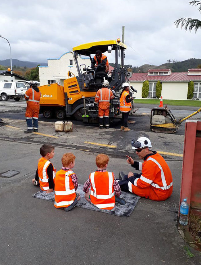 These Workmen Are Awesome. This Man Has Sat Down For A Few Minutes To Explain To Our Boys All About The Road Works