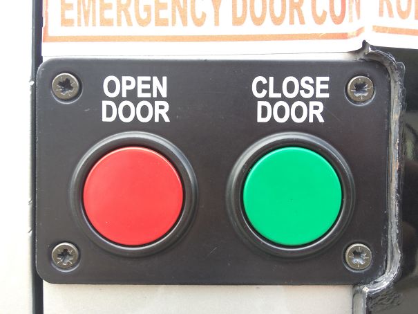 The Color Choice For The Emergency Door Buttons On A Bus