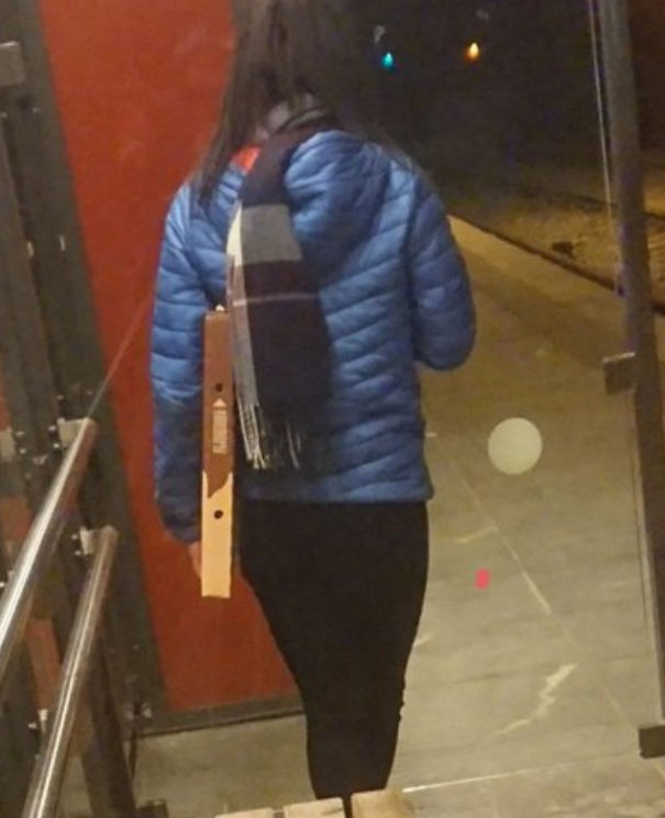 People Carrying Their Pizza Like This