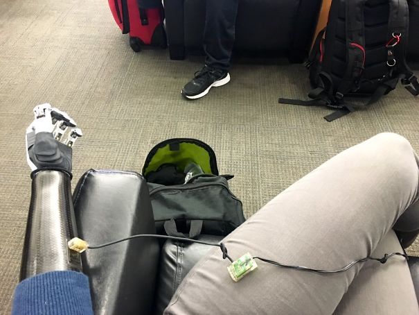 Forgot To Charge Arm Last Night. Charging At Cellphone Charge Area At Airport