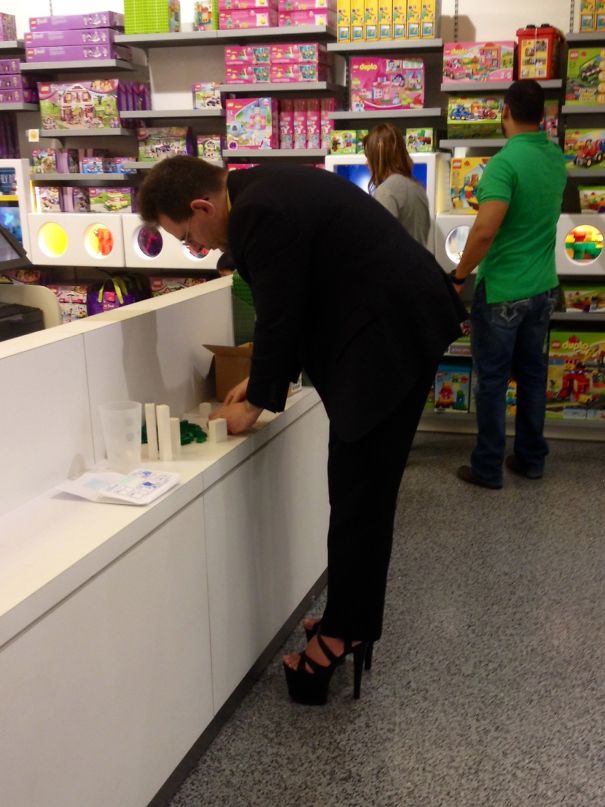 Just Your Average Businessman Wearing Hooker Heels In The Lego Store