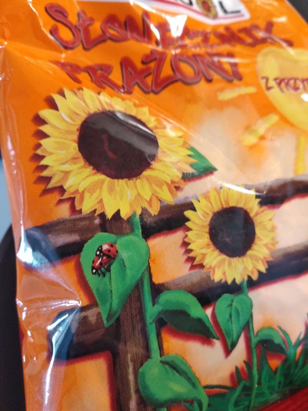 Two Ladybugs Having Sex On A Sunflower Seeds Package