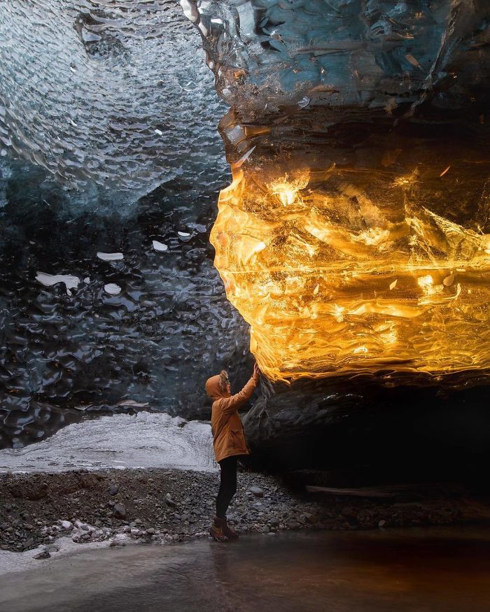 The Golden Rays Of The Sunset Entered The Cave At Just The Right Angle To Light Up This Section Of Ice, Making It Look Like Amber