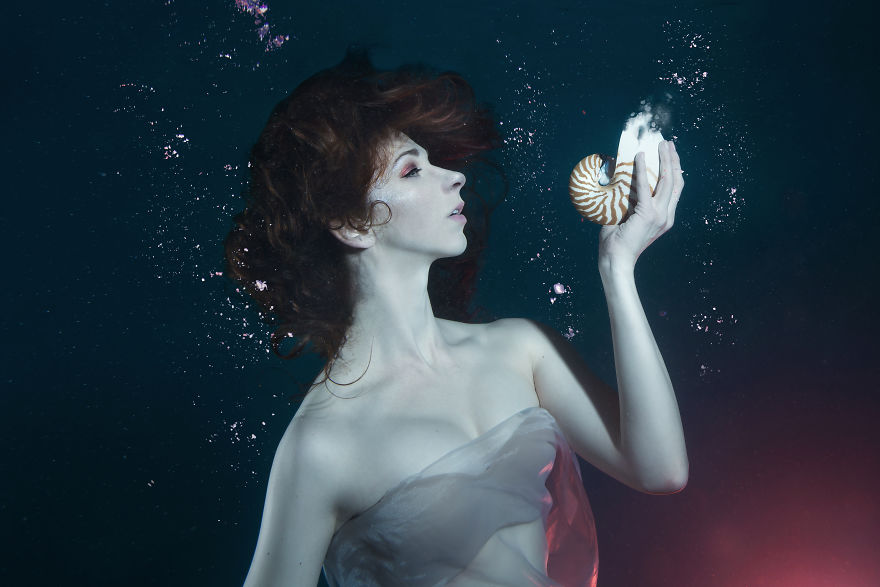 I Performed Underwater Holding Dissolving Shells To Convey The Effects Of Ocean Acidification