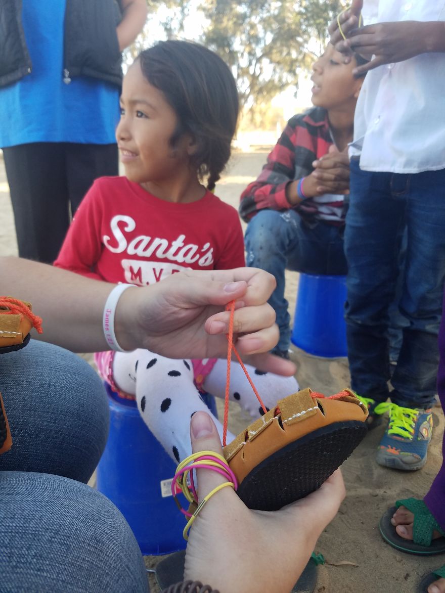 Giving Shoes To Children Who Need Them Most