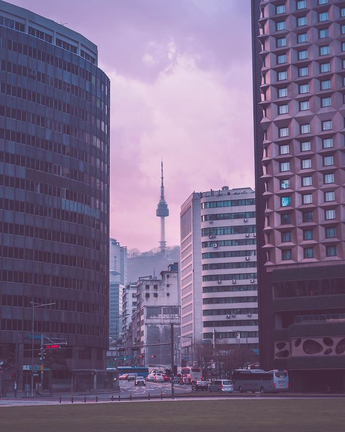 Seoul cityscape with tall buildings and Namsan Seoul Tower in the background, showcasing life as an English teacher.