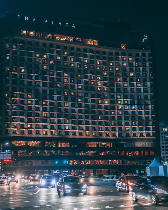 Night view of The Plaza hotel in Seoul with cars passing by, captured by an English teacher living in Seoul.