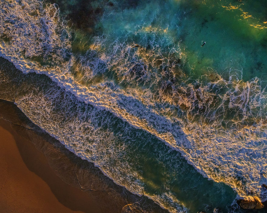 Drone Shots Of The Surfers On Llandudno Beach