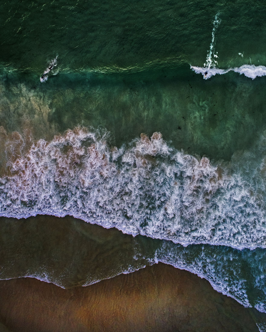 Drone Shots Of The Surfers On Llandudno Beach