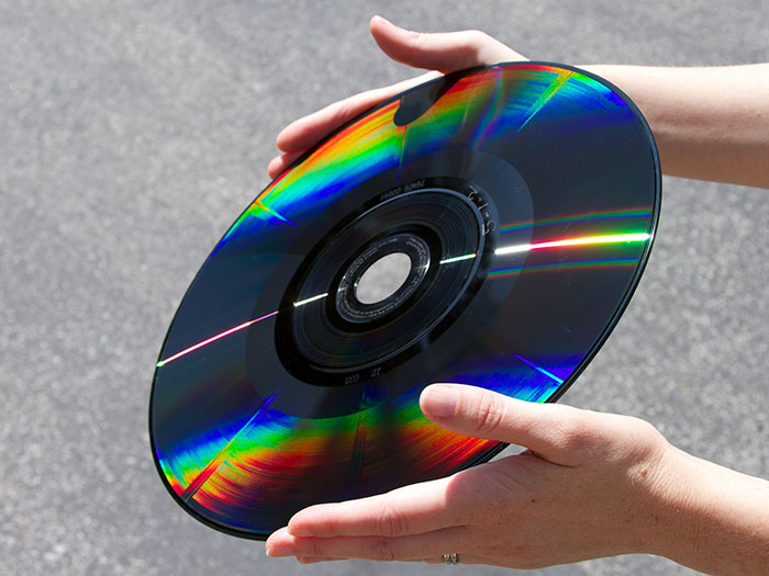 Person holding Laserdisc, Philips