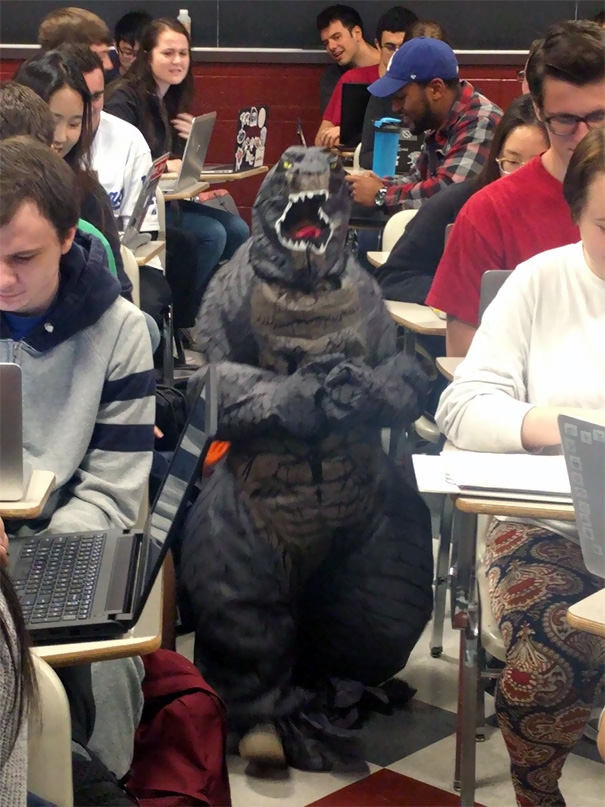 My Cousin's Son Is On Spring Break, So Today She Brought Him To Help Teach Her Class. He Decided To Wear His Godzilla Outfit