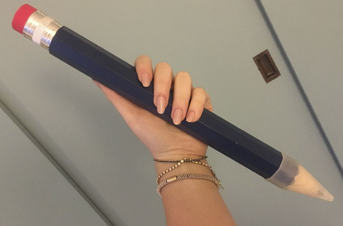 Woman Finally Finds Genius Way To Use Her GIANT Pencil She Got As Gift, And It’s Hilariously Savage