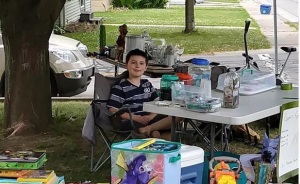 Boy Sells His Toys To Pay For His Service Dog's Treatment