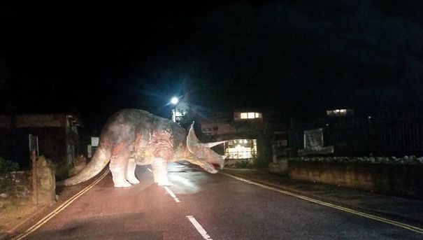 Drunk Guys Vandalise An Amusement Park And Put Fake Dinosaur In The Middle Of A Busy Road. Isle Of Wight England