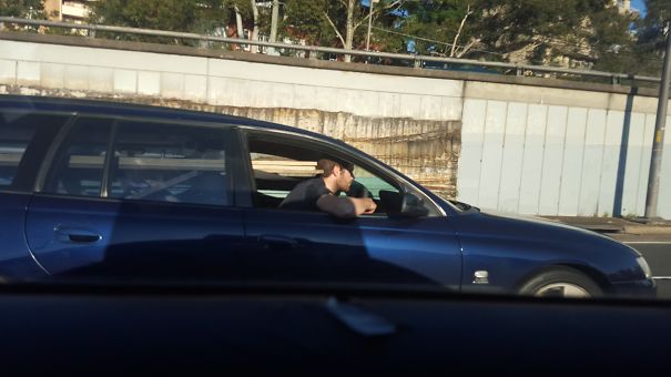 Driving Over Harbour Bridge, Spotted This Guy On His Way To Collect His Darwin-Award