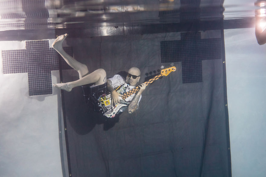 Photographer Creates Epic Band Shot By Taking The Group Underwater