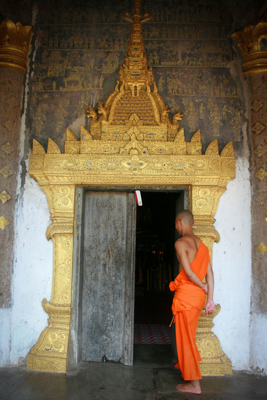 A Monk Invites Me To Visit The Monastery Of Wat Xieng Thong In Luang Prabang