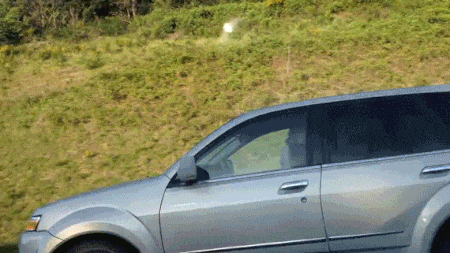 Curling Hair With A Curling Iron While Driving On A Highway At 90 km/h