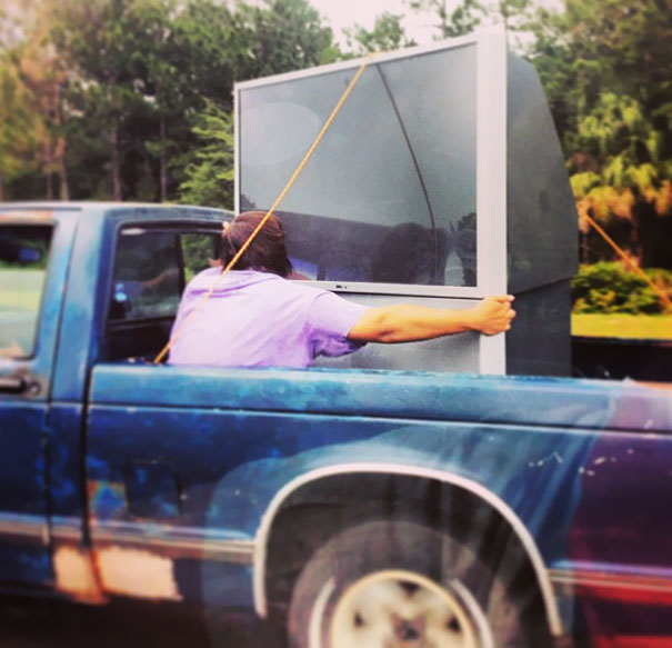Seen On I-95 Today. "Hey Don't Worry About Securing That Giant TV With A Big Rope Because, I Got This!"