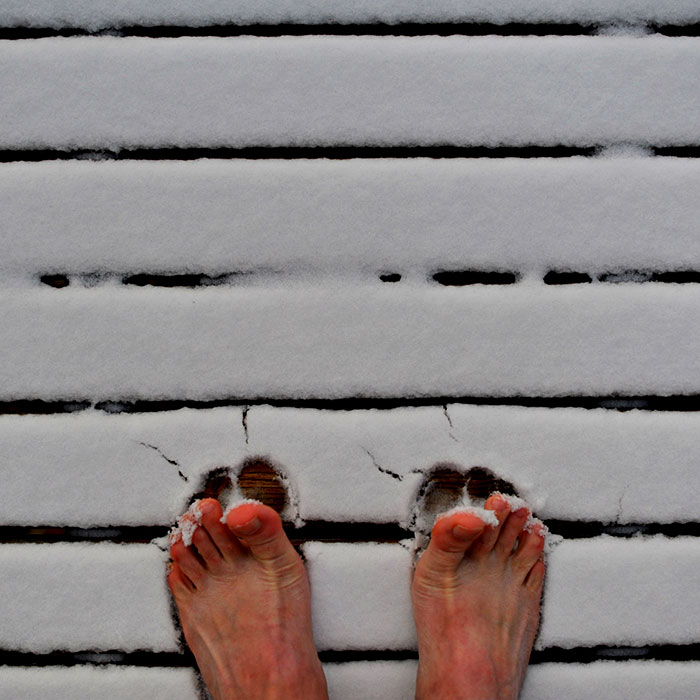 Bare feet on snow
