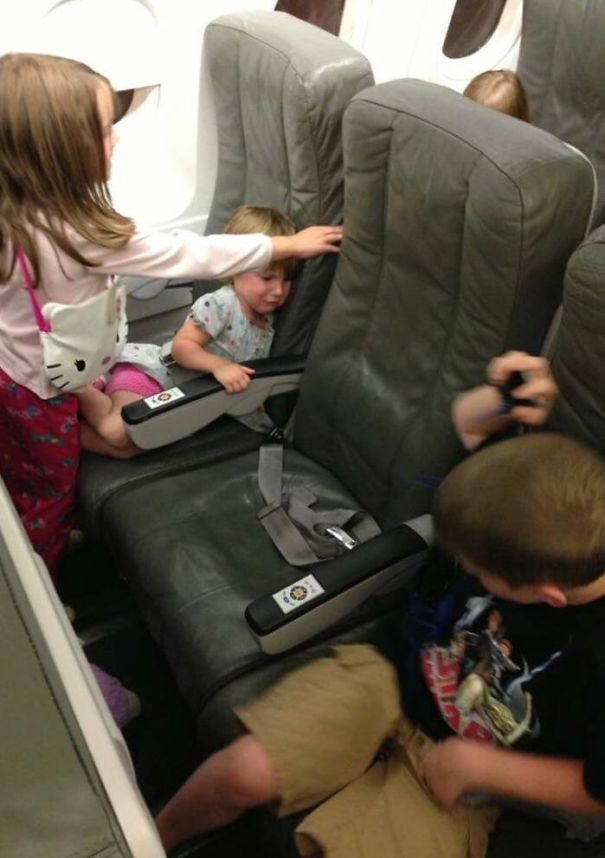 Red-Eye Flight Seattle To NY And I Don’t Know These Kids. That’s My Seat In The Middle
