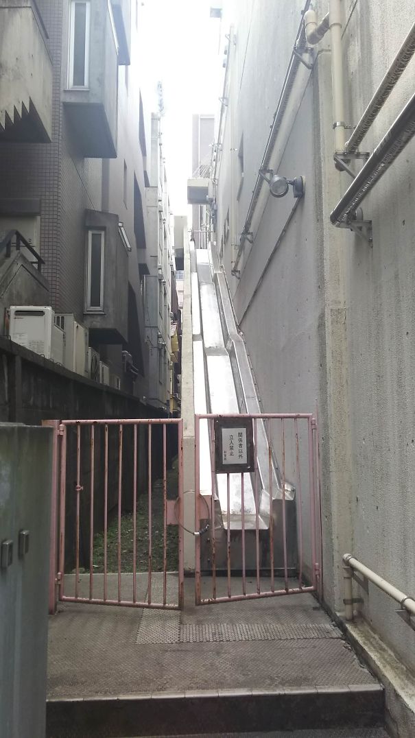 The Fire Escape For This Building Is A Slide