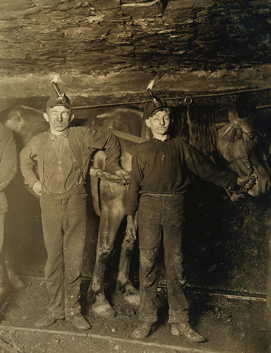Drivers In A Coal Mine Co. Plenty Boys Driving And On Tipple. No Trappers Used, As Mine Is Ventilated By Another System. Location: West Virginia