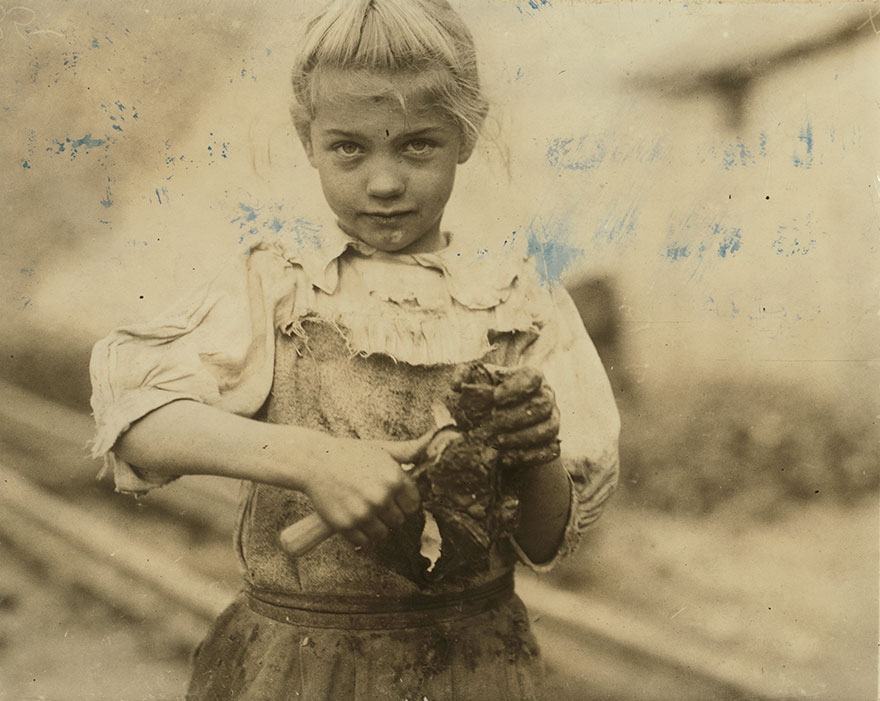 7-Year Old Rosie. Regular Oyster Shucker. Her Second Year At It. Illiterate. Works All Day. Shucks Only A Few Pots A Day. Varn & Platt Canning Co. Location: Bluffton, South Carolina