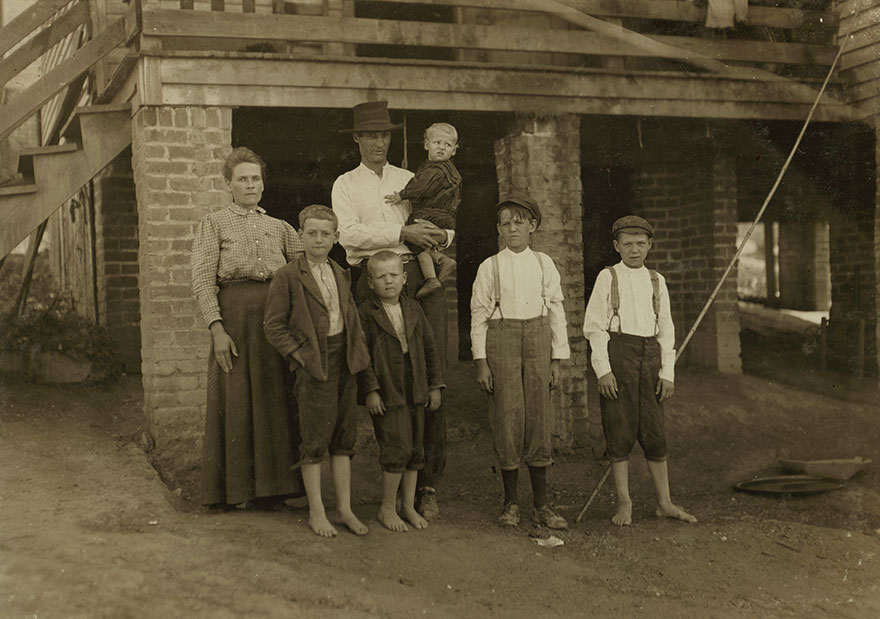 S.d. Ison And Family. Father Works Some. Both Boys On Right Of Photo Have Been In Washington Cotton Mills, Fries, Va., For Four Years. When I Asked The Smallest Worker How Old He Was, He Said, "Don't Know," And Looked At His Father, Who Said, "Going' On 14." Location: Fries, Virginia