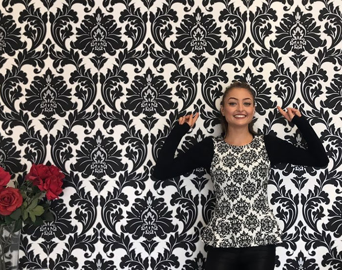 Our Enthusiastic Trainee Chiara, Came Into Work Today Wearing The Same Patterned Top As Our Wall Paper