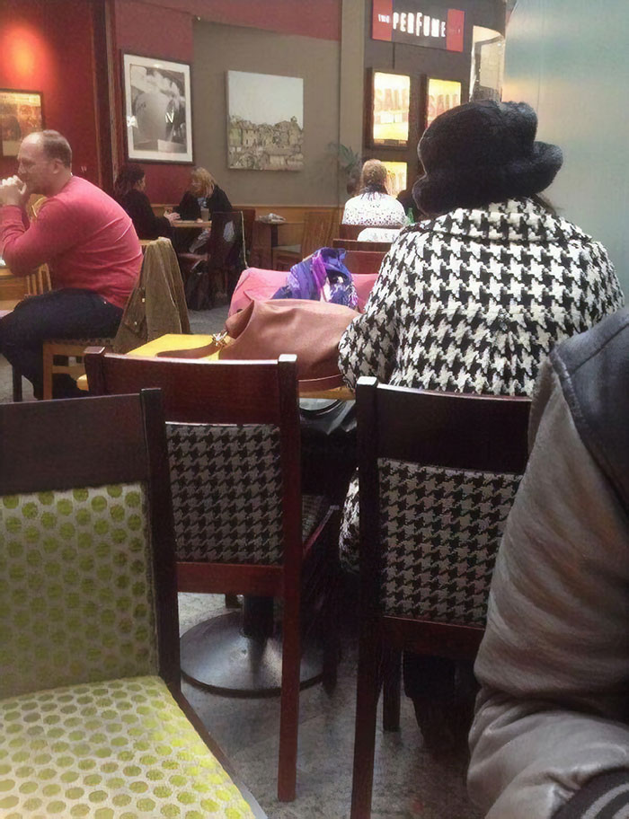 Her Coat Had The Same Pattern As The Chair
