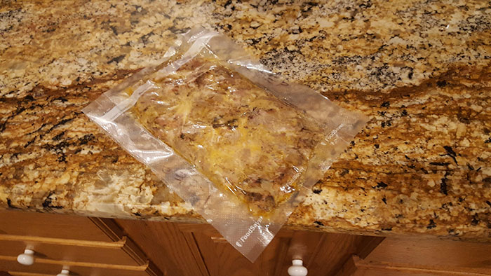 This Vacuum Packed Pulled Pork BBQ On The Kitchen Counter